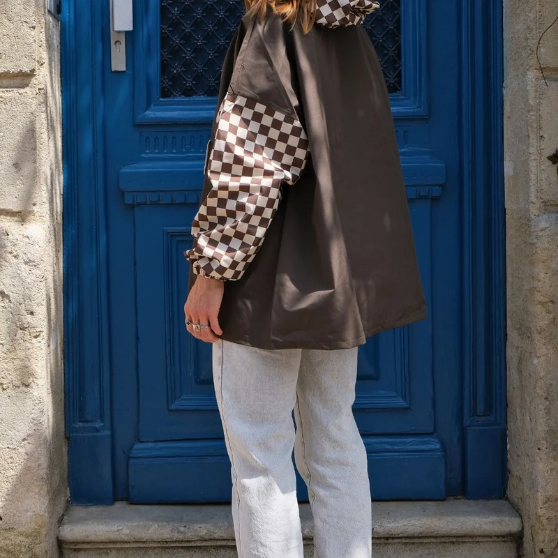 Poncho de pluie court Poule Party adulte Damier Kaki
