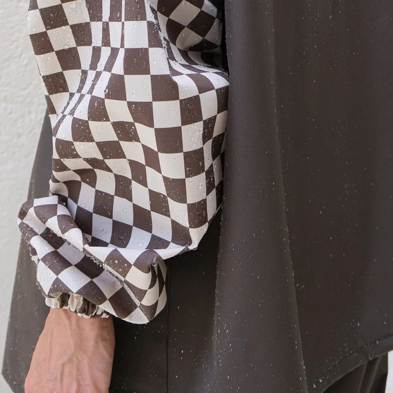 Poncho de pluie court Poule Party adulte Damier Kaki