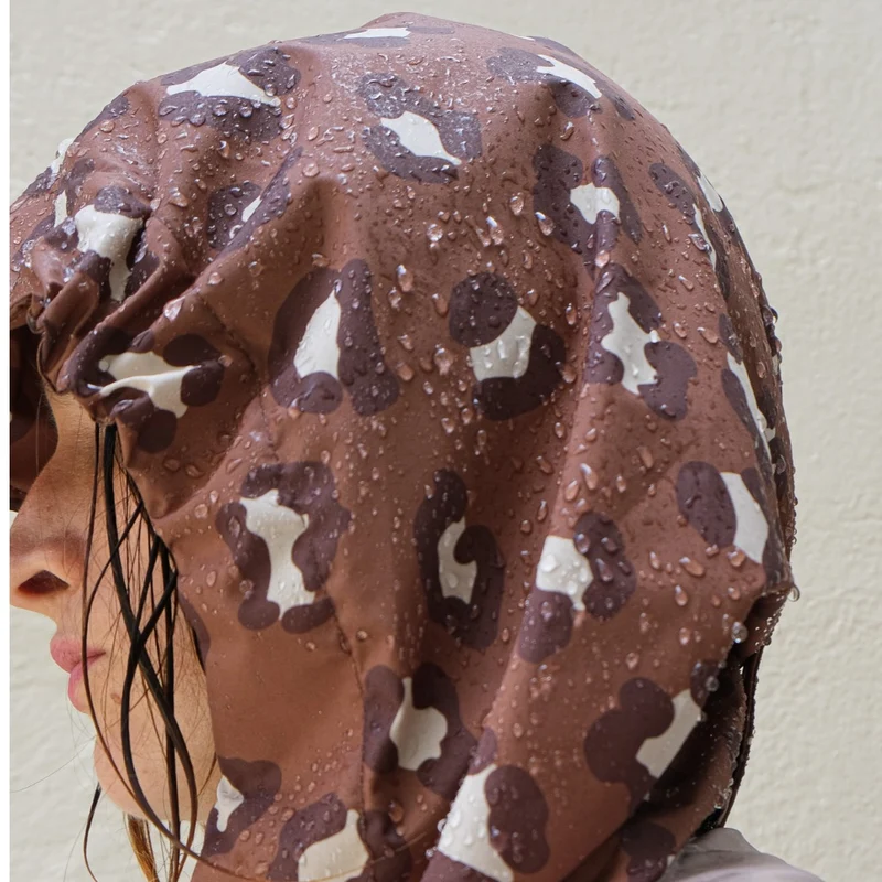 Poncho de pluie court Poule Party adulte Léopard