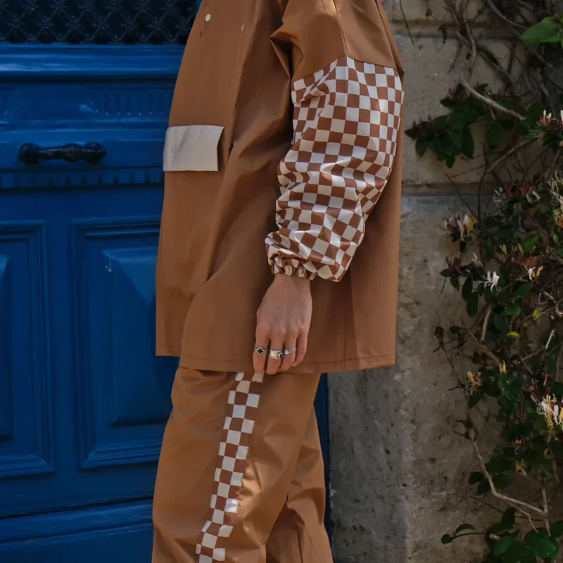 Pantalon de pluie Poule Party adulte Damier Marron