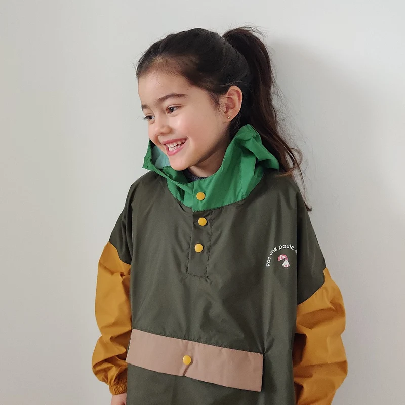 Poncho de pluie Poule Party adulte ou enfant kaki