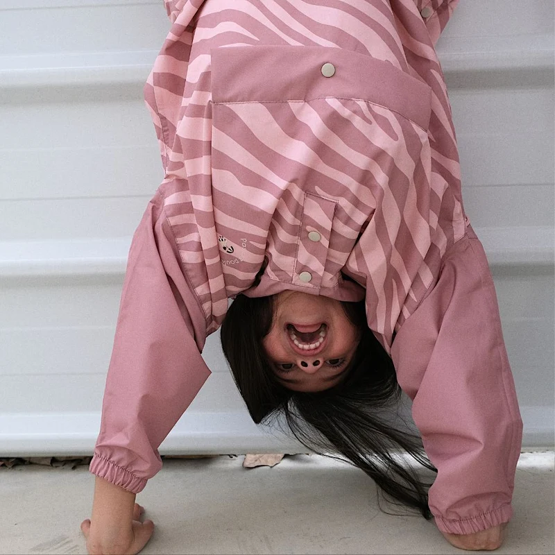 Poncho de pluie Poule Party adulte ou enfant zebra