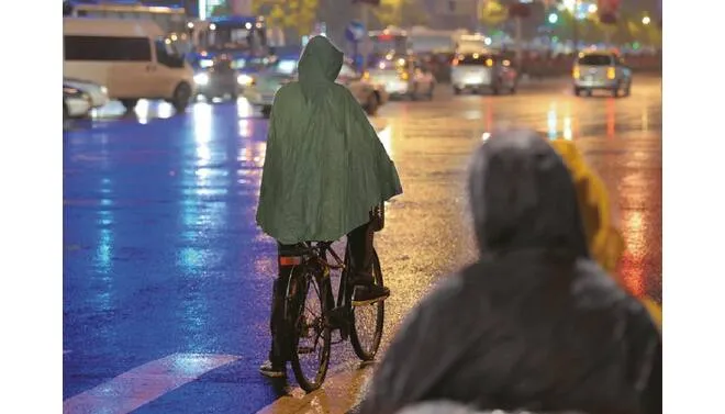 Wiederverwendbarer Poncho grün – Material PVC, leichtgewichtig