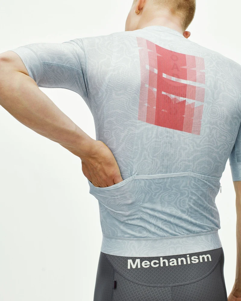 Pas Normal Studios Kurzarm Trikot Mechanism Logo Herren AOP RTN Light Aqua