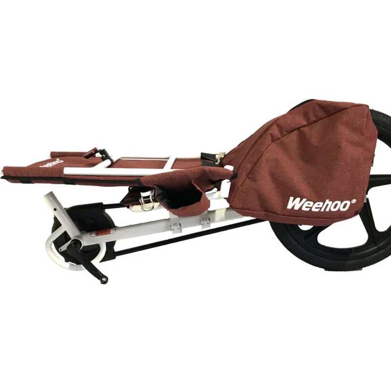Remorque vélo enfant avec pédales et sacoches Thrill Weehoo