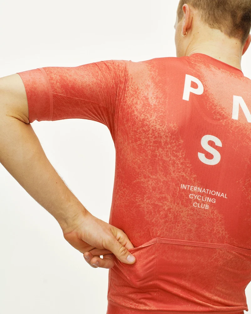 Pas Normal Studios Mechanism Kurzarm Trikot Herren AOP Hibiscus Orange